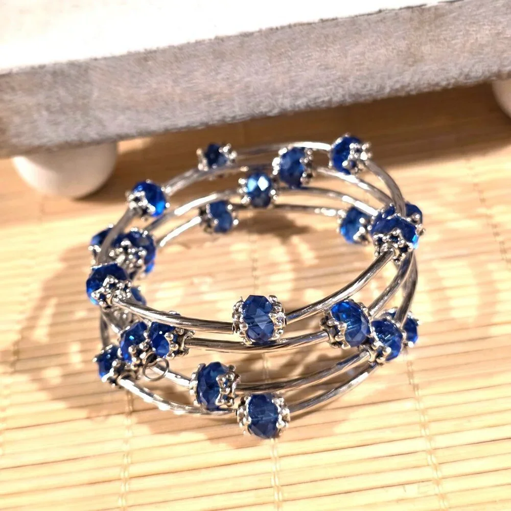 Silver Tone Crystal Wrap Bracelet With Blue Faceted Beads & Filigree Details